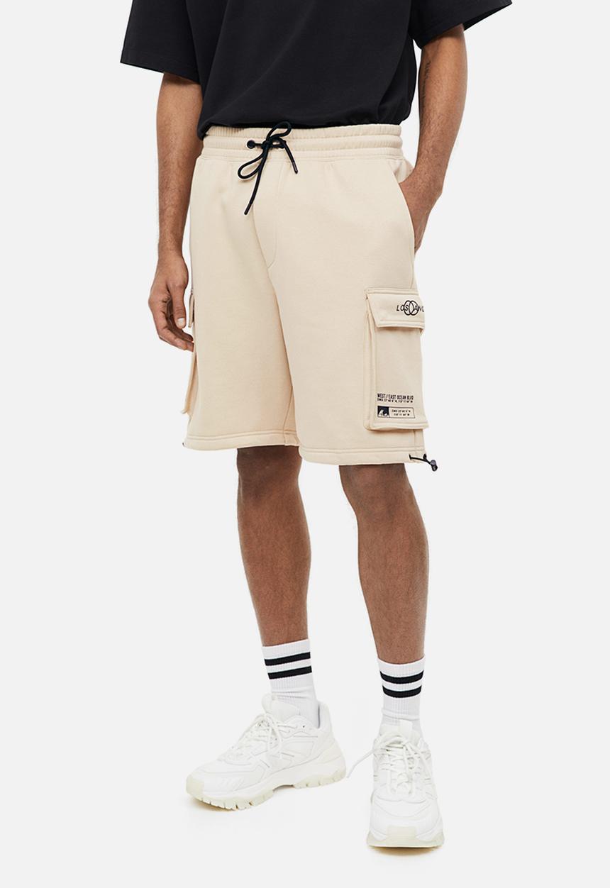 H&M - Relaxed fit printed cargo sweat shorts - beige los angeles
