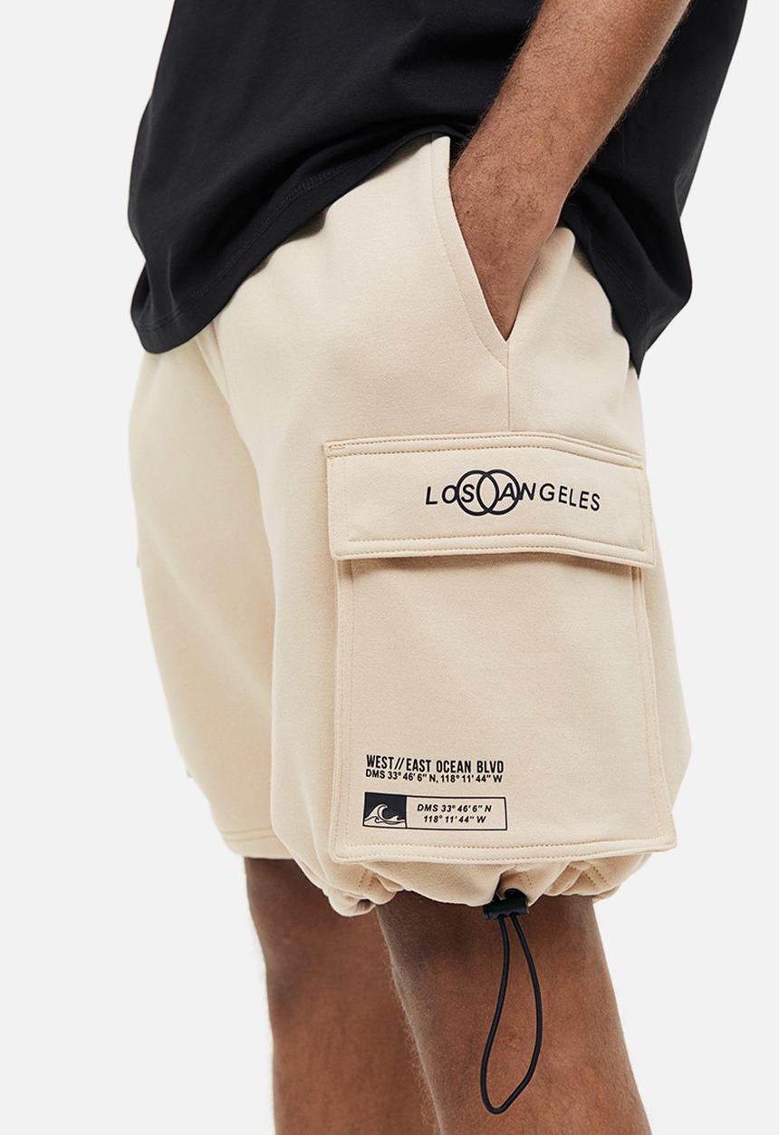 H&M - Relaxed fit printed cargo sweat shorts - beige los angeles