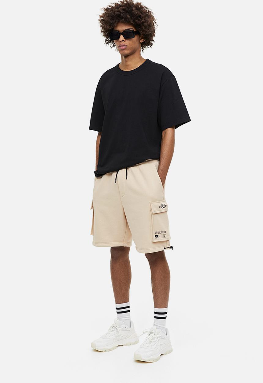 H&M - Relaxed fit printed cargo sweat shorts - beige los angeles