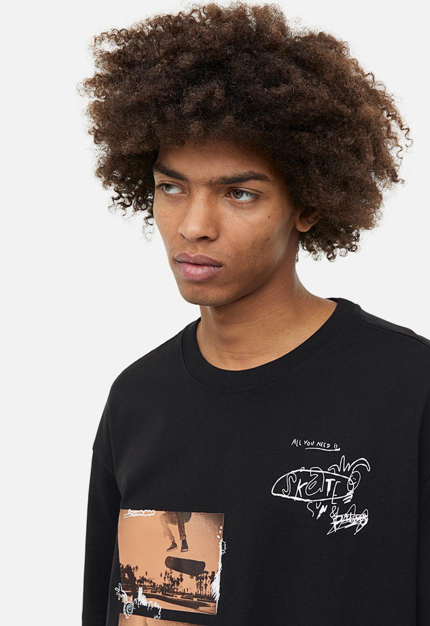 H&M - Relaxed fit printed T-shirt - black happens in la