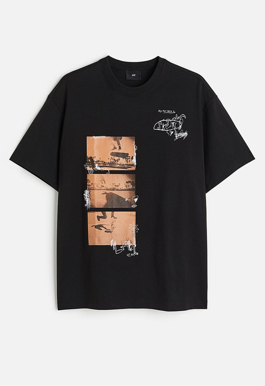H&M - Relaxed fit printed T-shirt - black happens in la
