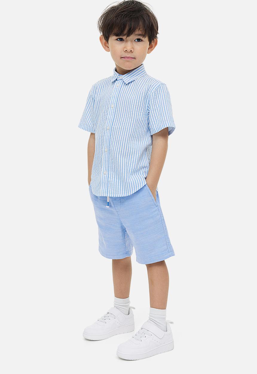 H&M - Loose fit chino shorts - light blue