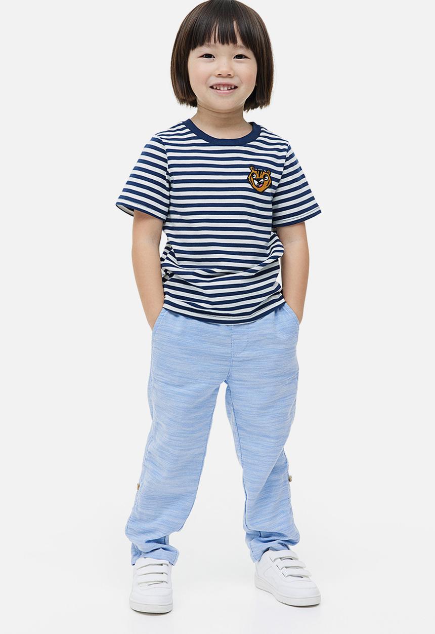 H&M - Loose fit roll-up trousers - light blue 