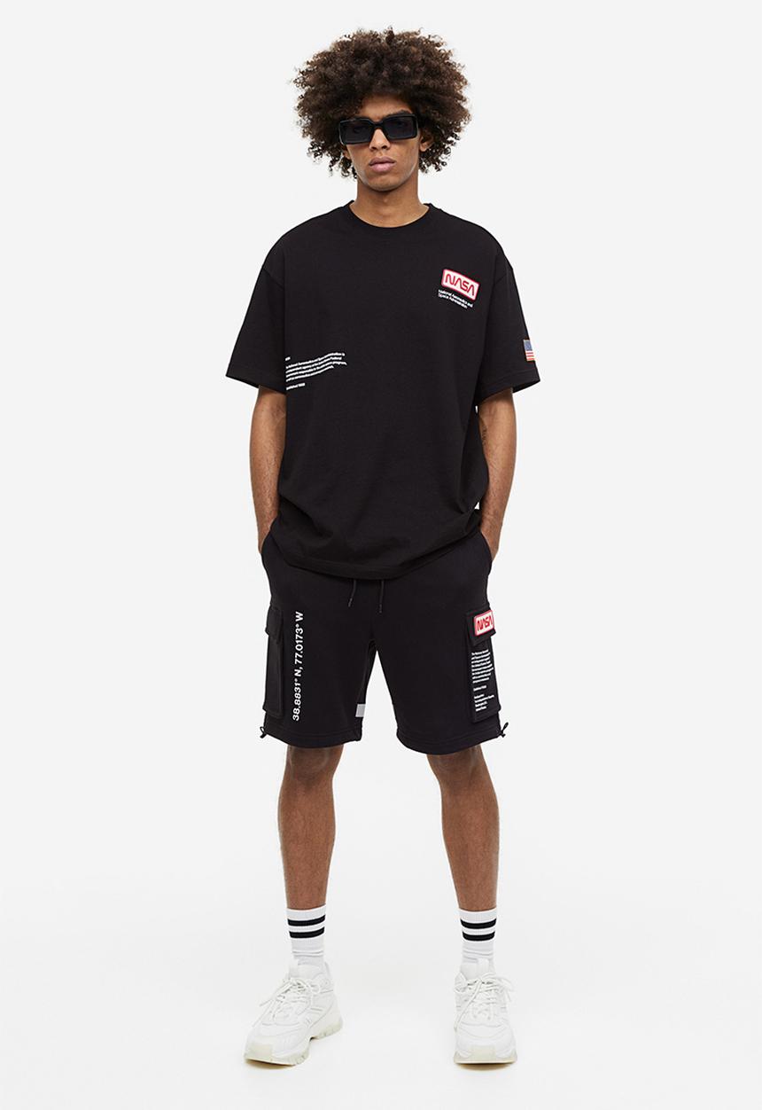 H&M - Printed sweatshirt shorts - black nasa