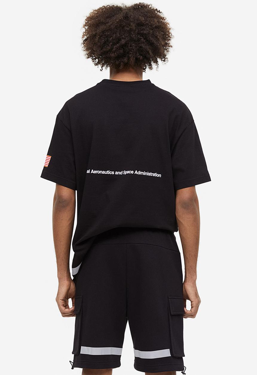 H&M - Printed sweatshirt shorts - black nasa