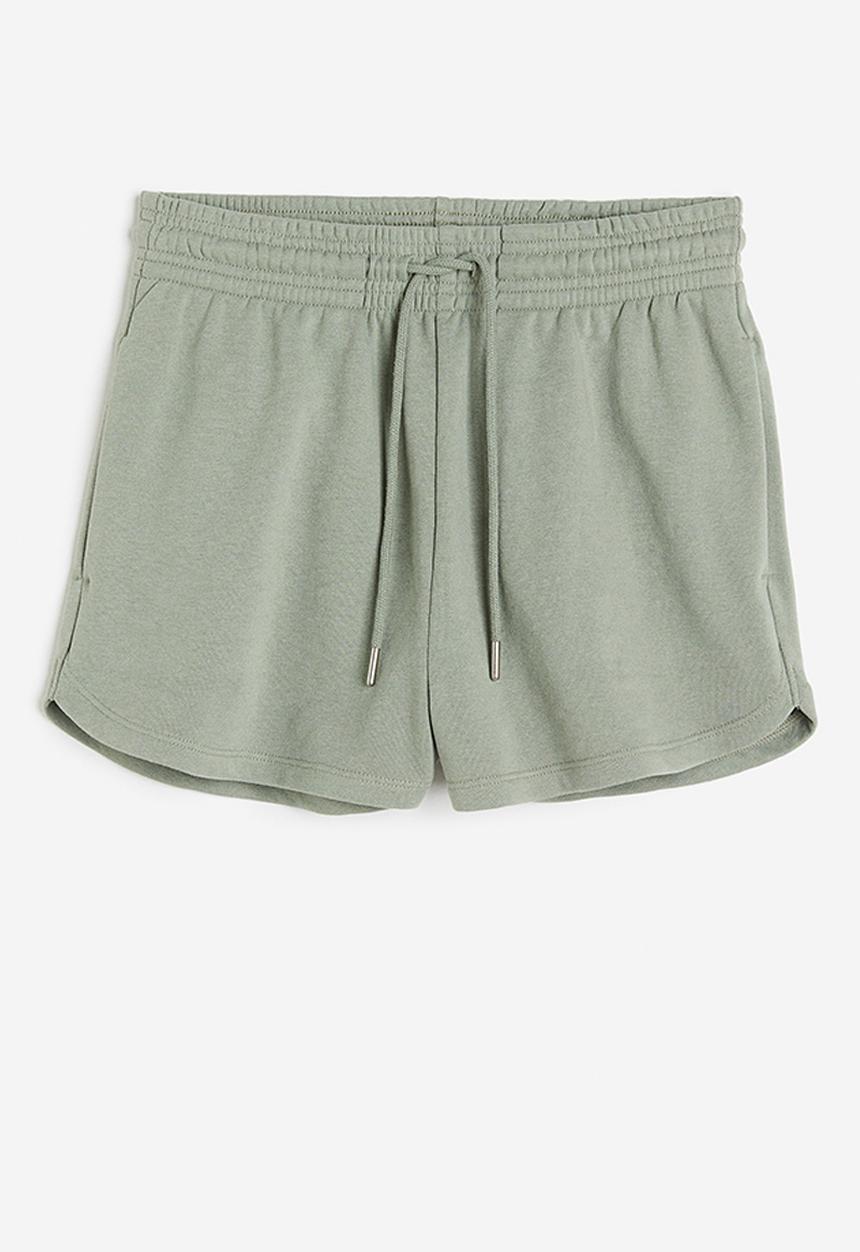 H&M - Sweatshirt shorts - sage green 