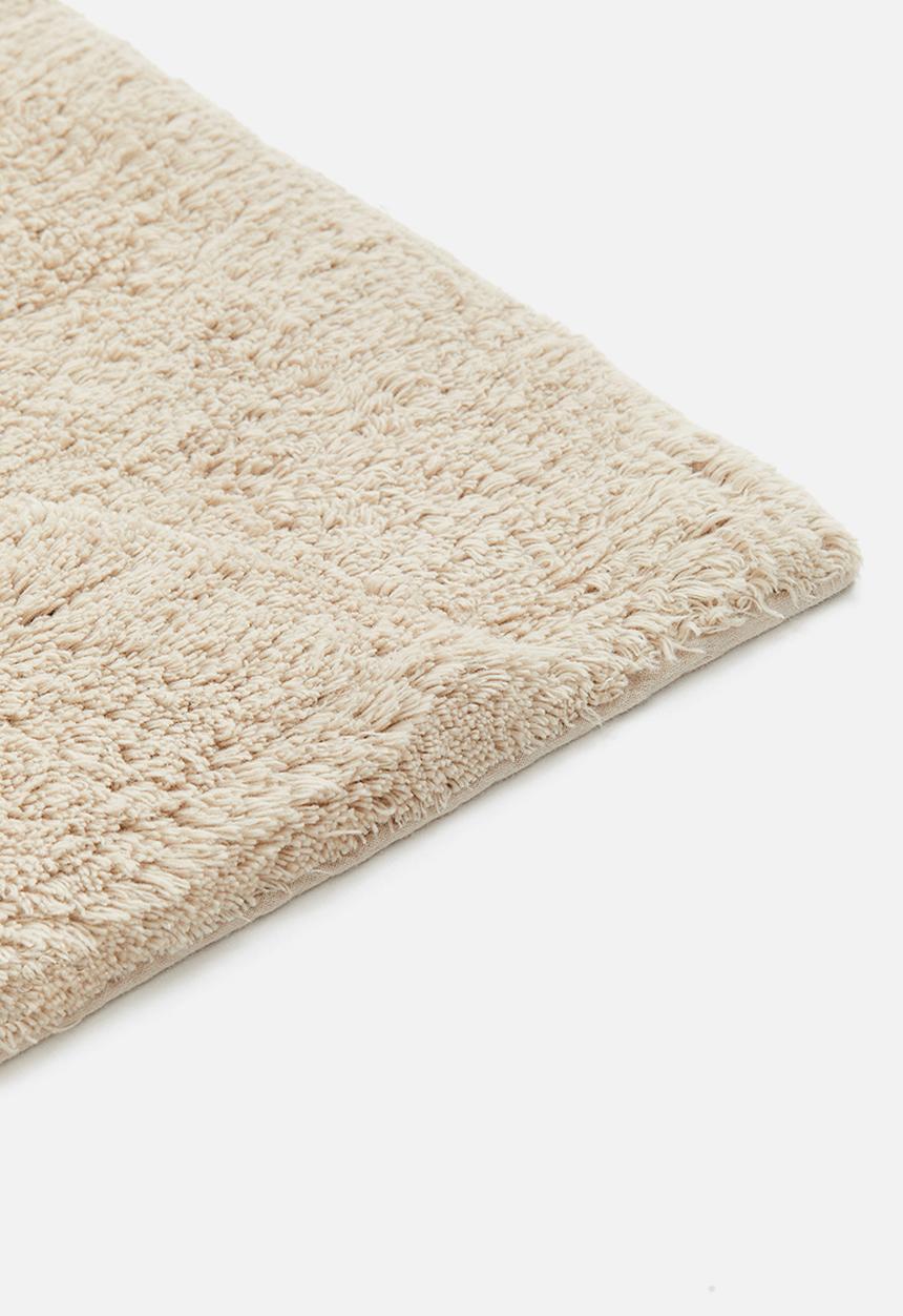 H&M - Tufted bath mat - light beige 