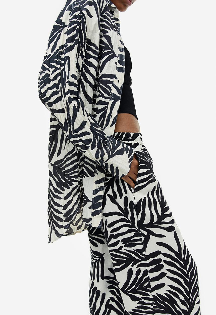H&M - Linen-blend pull-on trousers - cream leaf-patterned