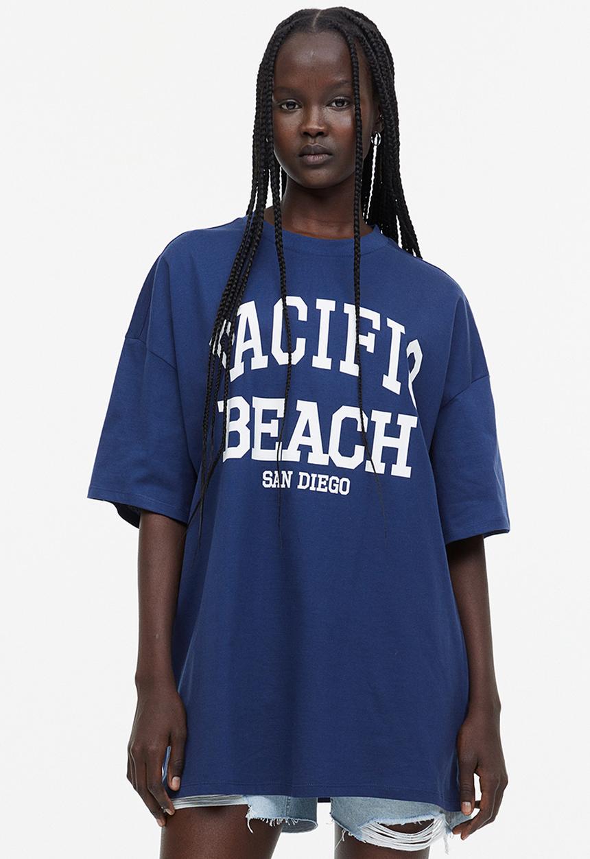 H&M - Oversized printed t-shirt - dark blue/pacific beach