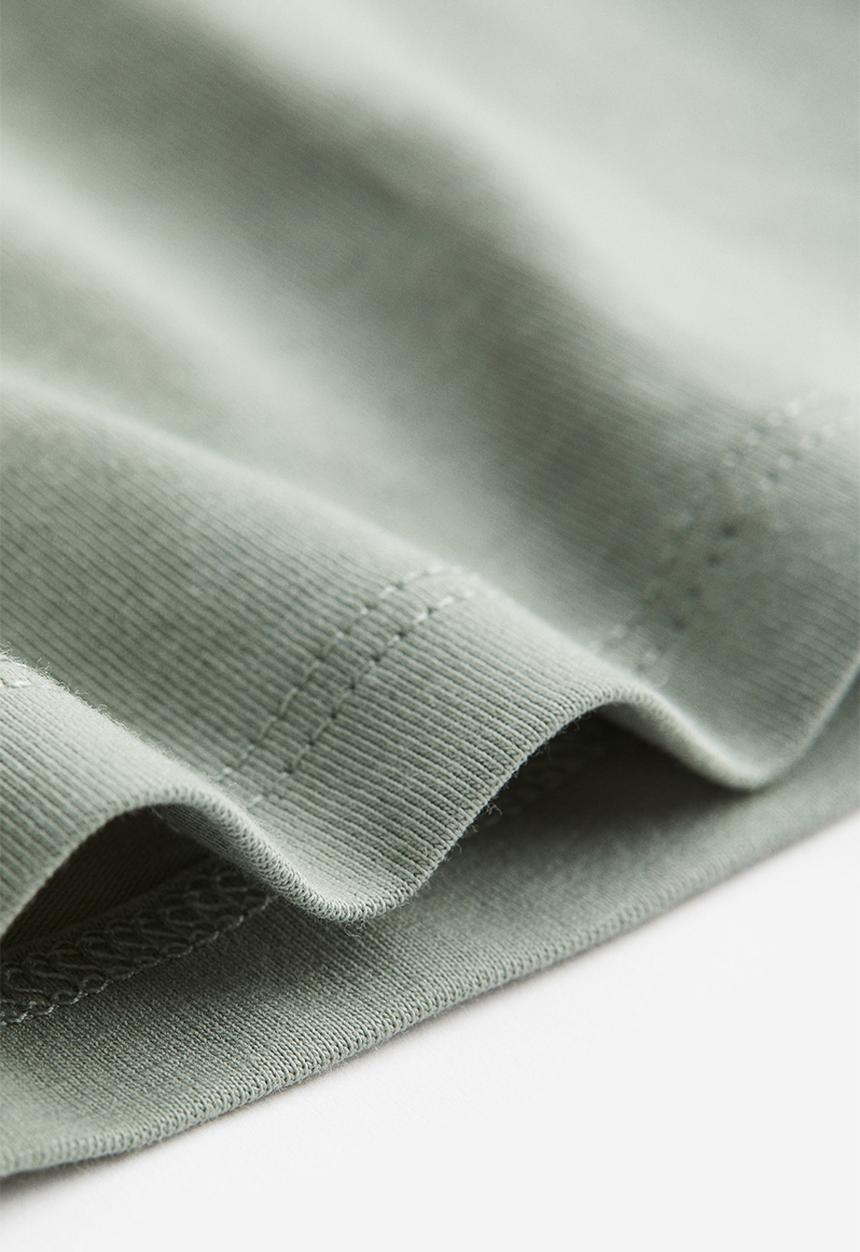 H&M - Fitted T-shirt - sage green