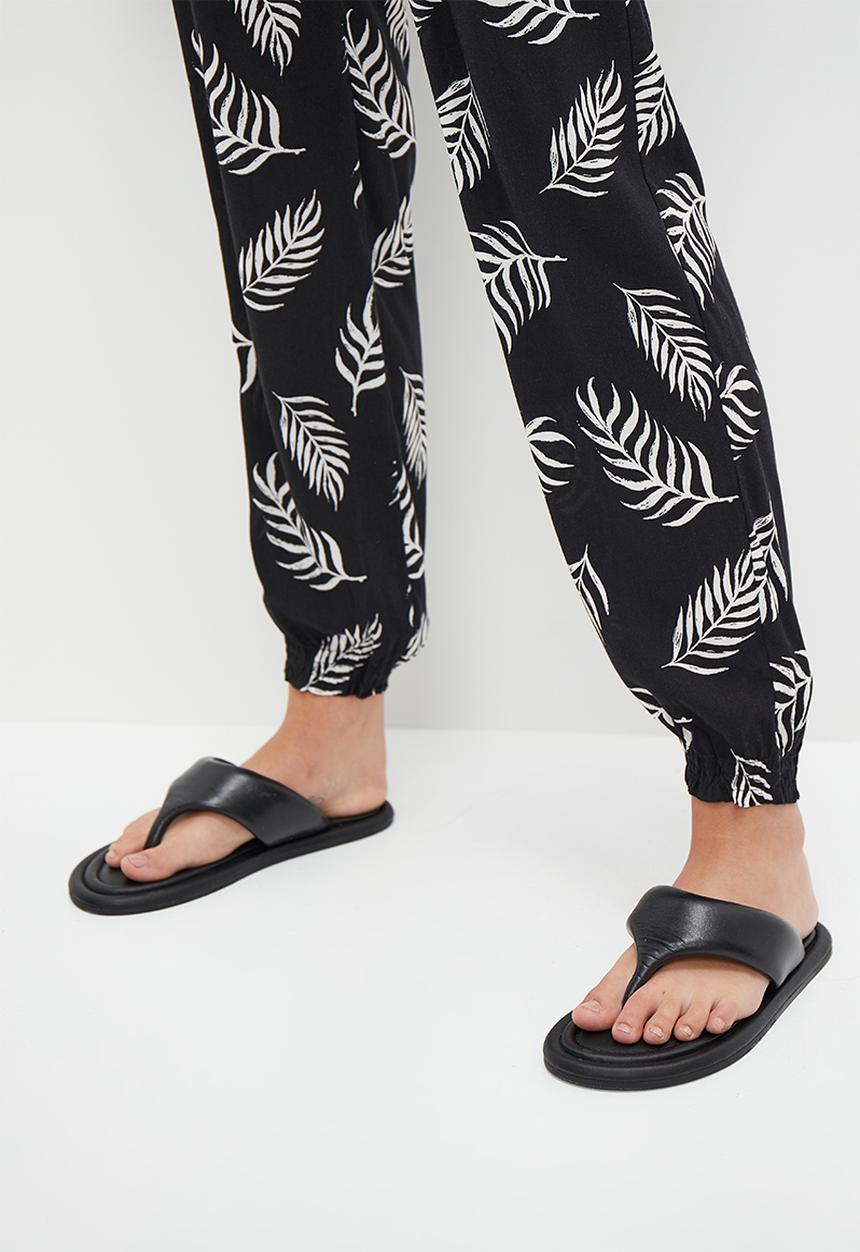 HAILYS - Feather print trousers - black