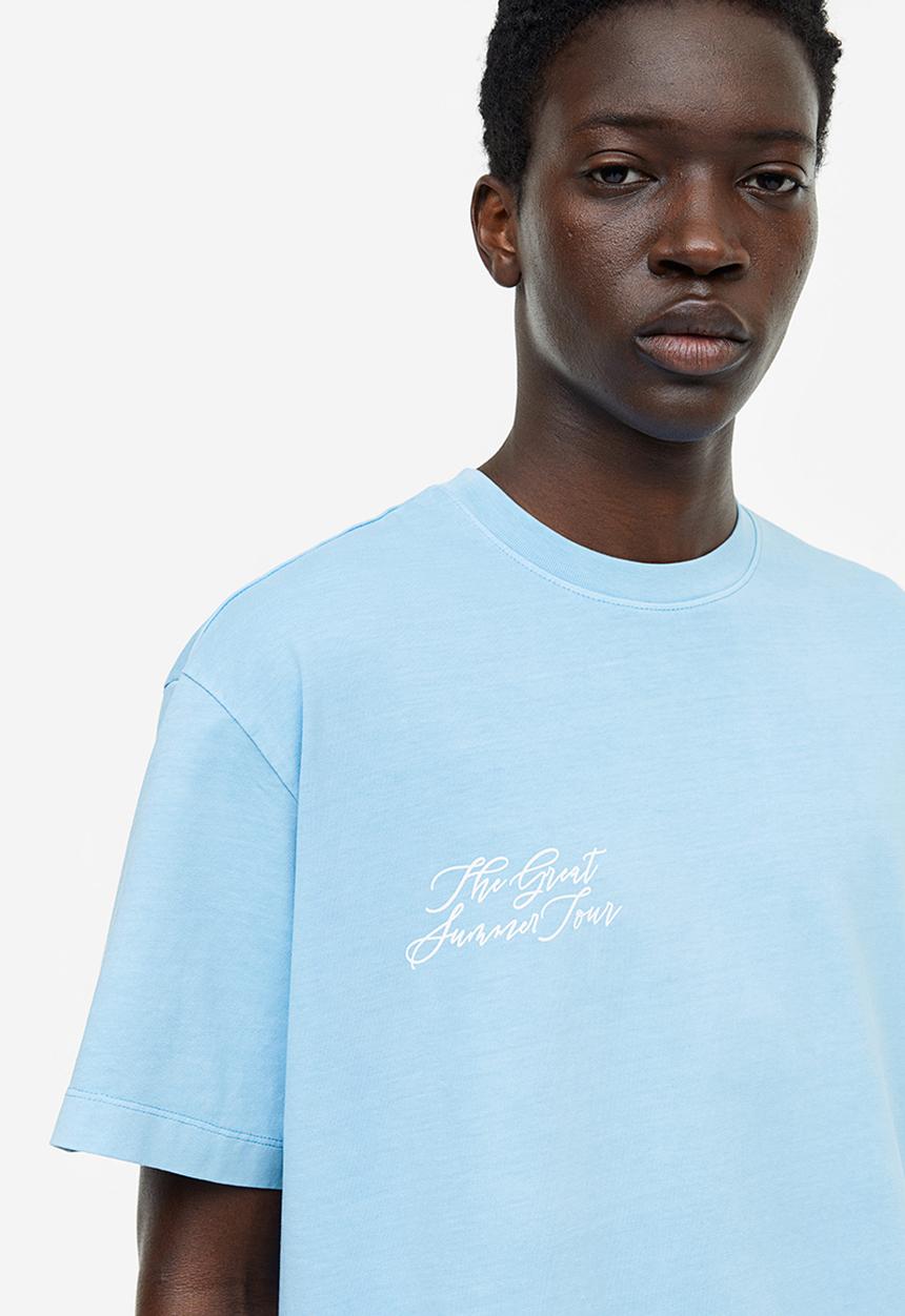 H&M - Relaxed fit printed T-shirt - light blue/summer tour