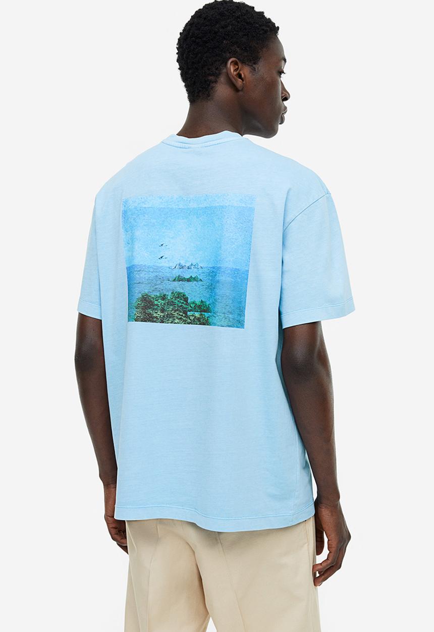 H&M - Relaxed fit printed T-shirt - light blue/summer tour