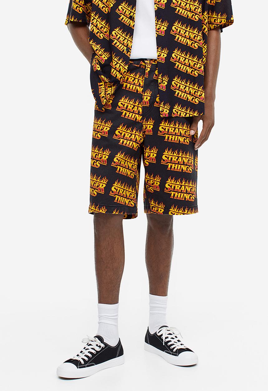 H&M - Loose fit printed twill shorts - black stranger things