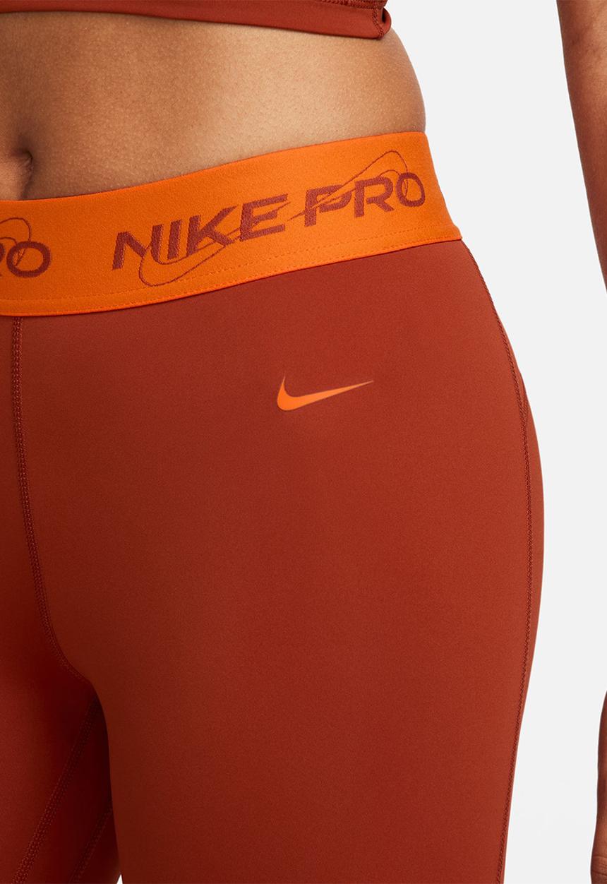Nike - W Np Df Mr Grx 7/8 Tght - Rugged Orange/Safety Orange