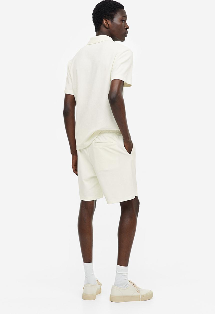 H&M - Regular fit terry shorts - cream