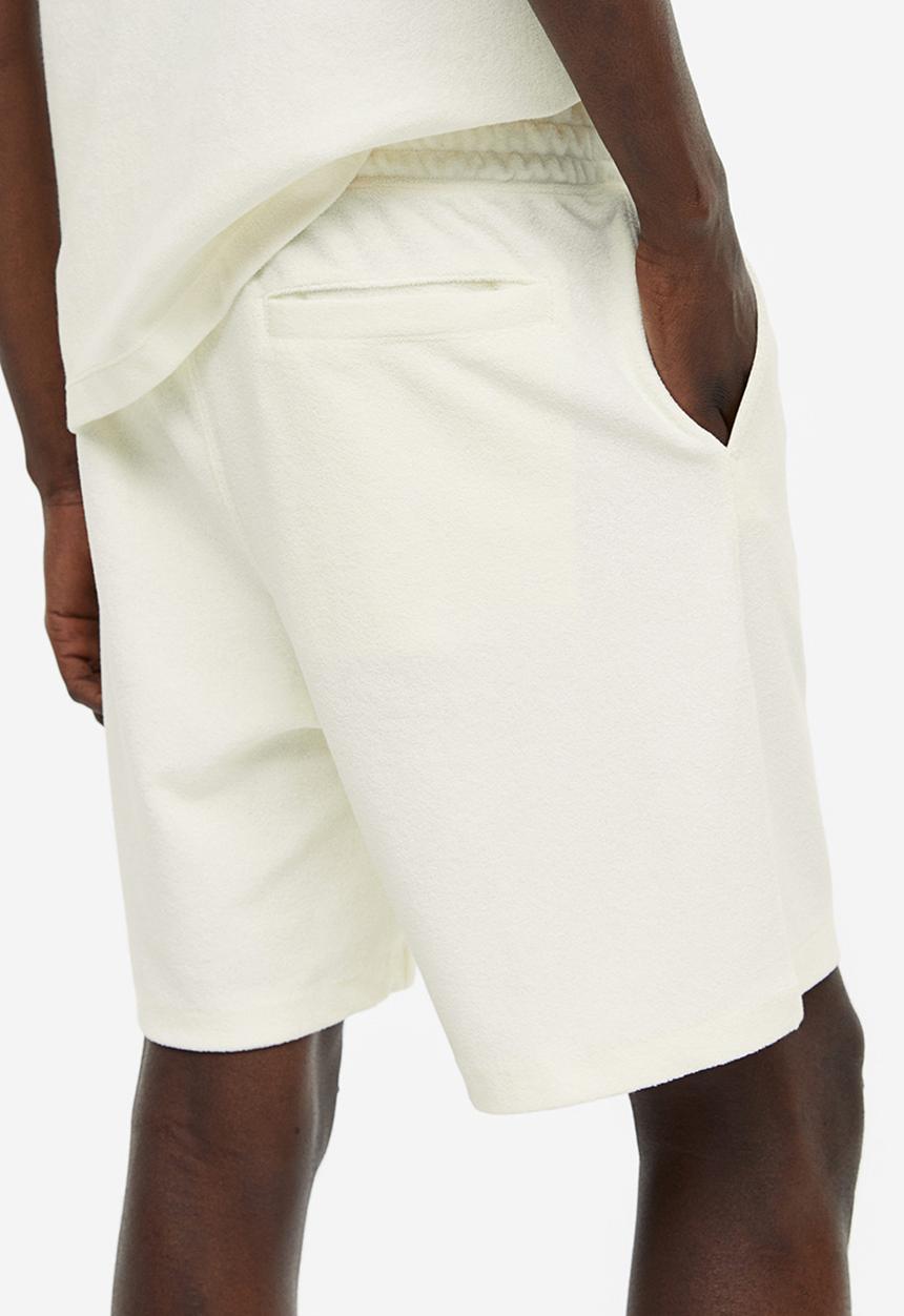 H&M - Regular fit terry shorts - cream