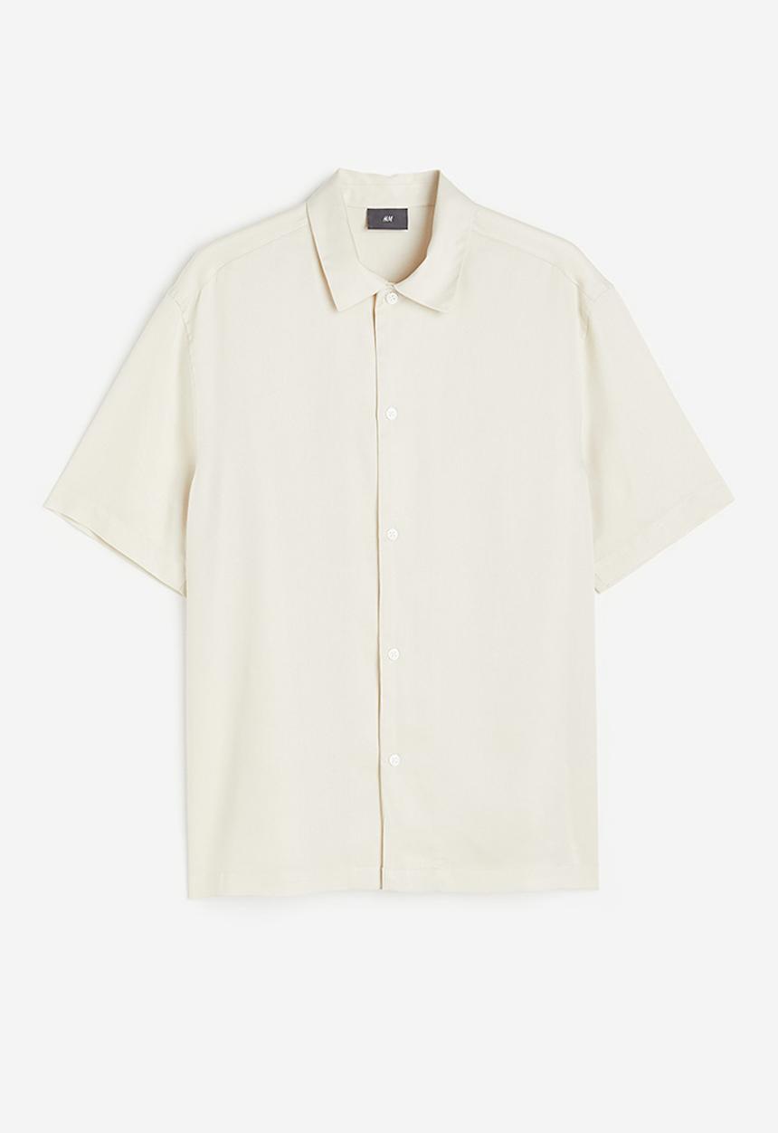 H&M - Regular fit short-sleeved lyocell shirt - beige