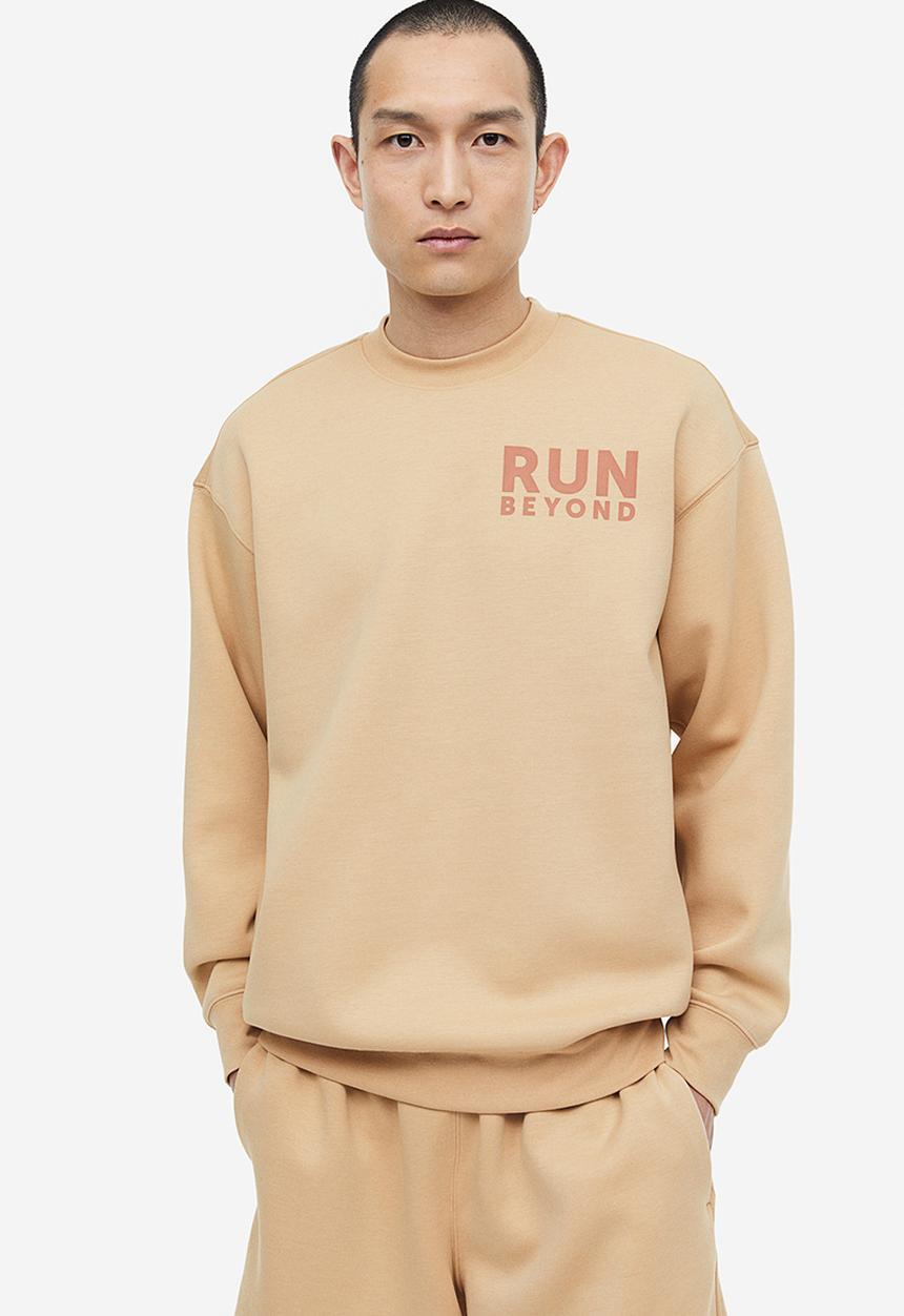 H&M - Drymove™ sports sweatshirt - beige