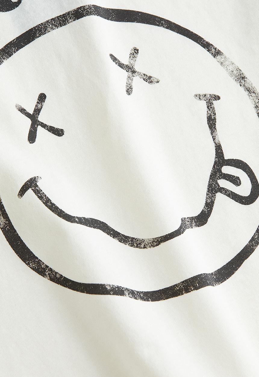 H&M - T-shirt with a motif - cream nirvana 