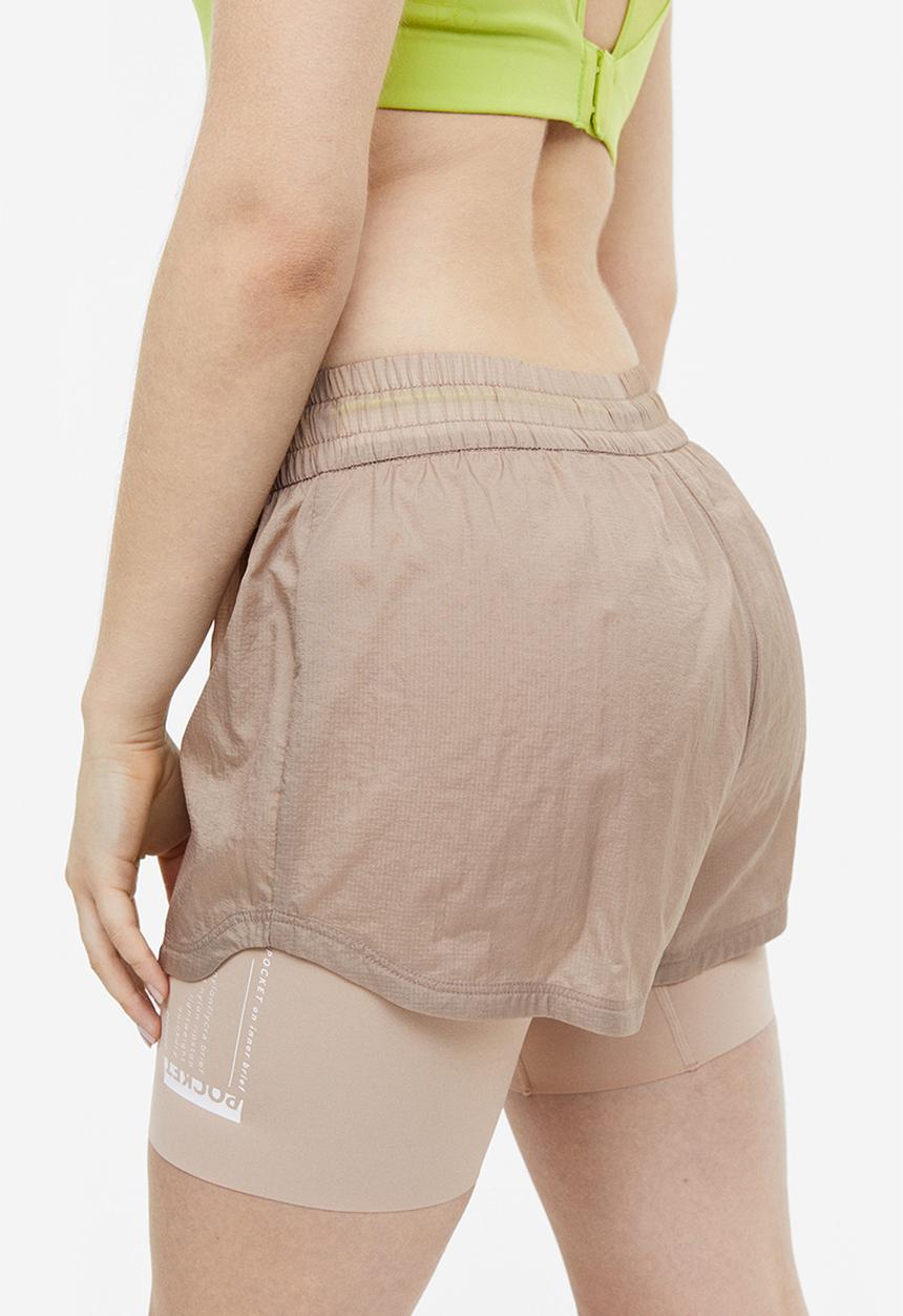 H&M - Drymove™ double-layered running shorts - beige