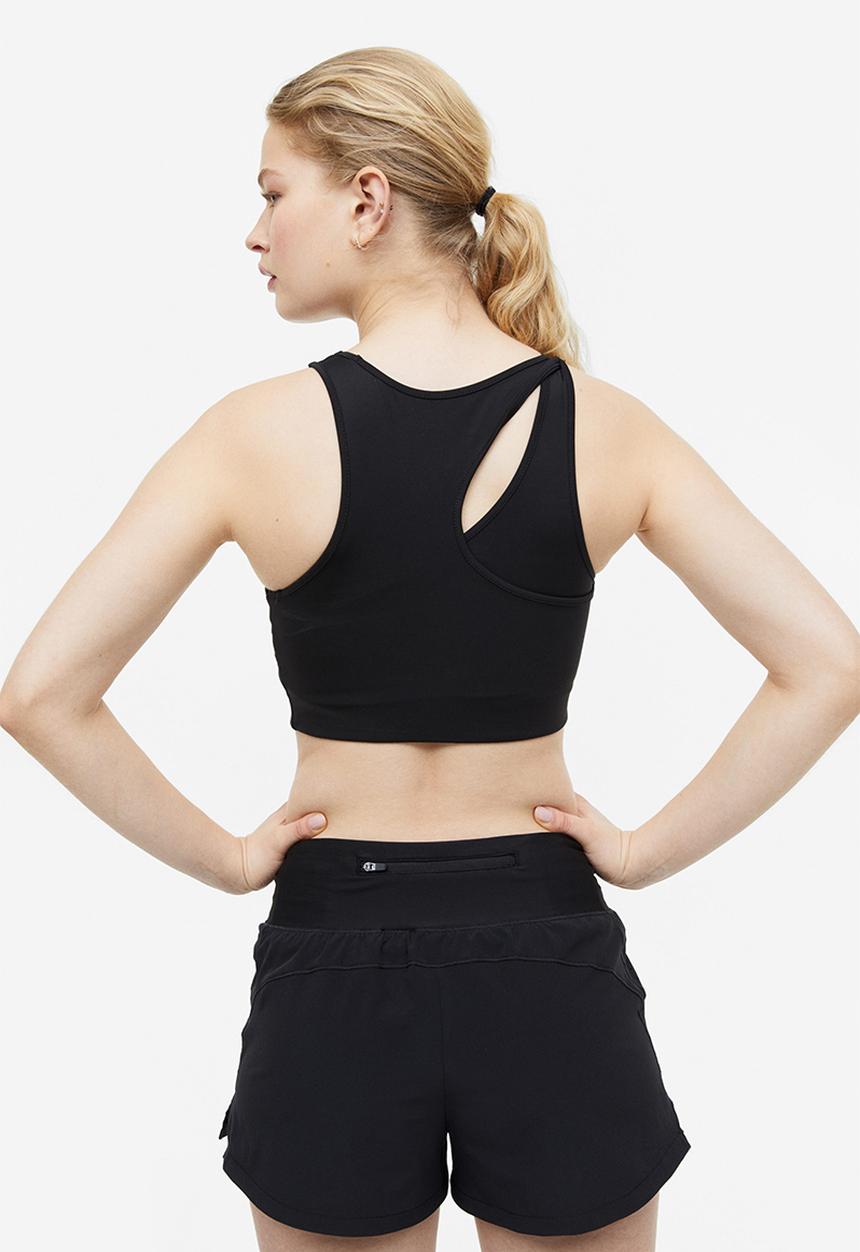 H&M - Drymove™ double-layered sports shorts - black