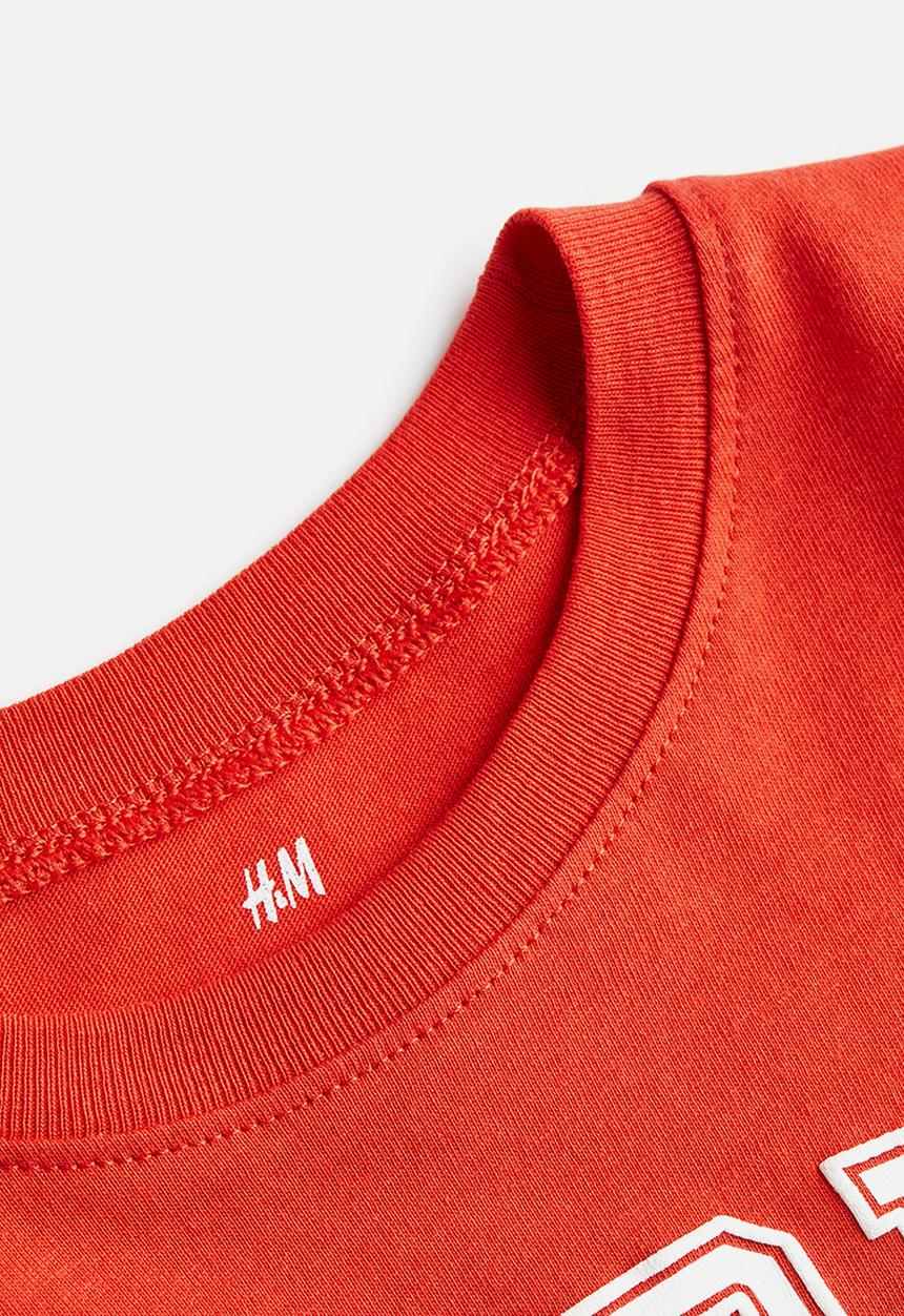 H&M - Cotton T-shirt - red world wide champ
