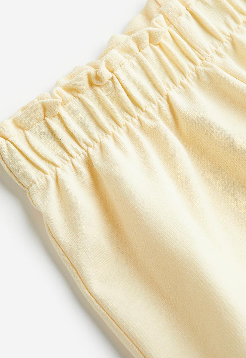 H&M - Paper bag sweatshorts - light yellow