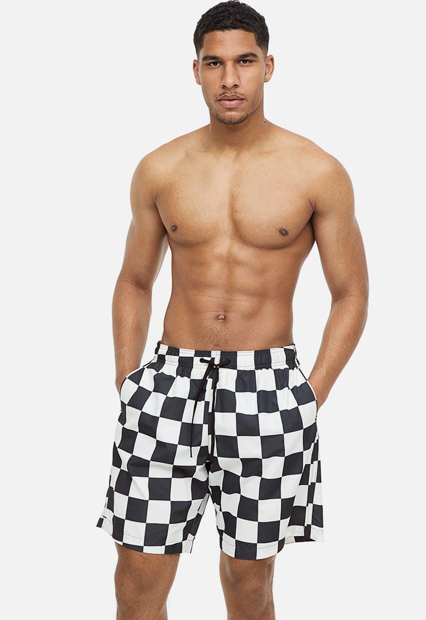 H&M - Patterned swim shorts - black/white checked