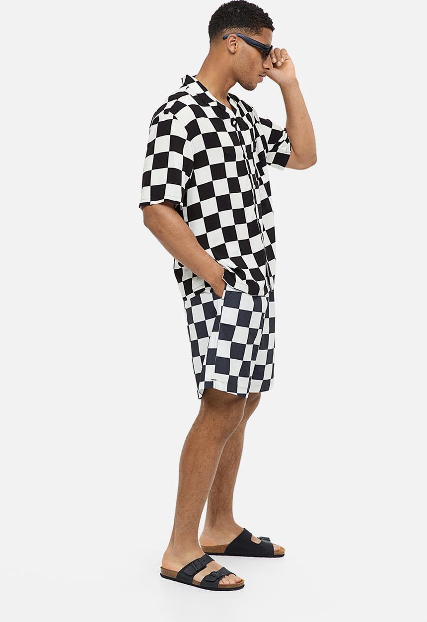 H&M - Patterned swim shorts - black/white checked