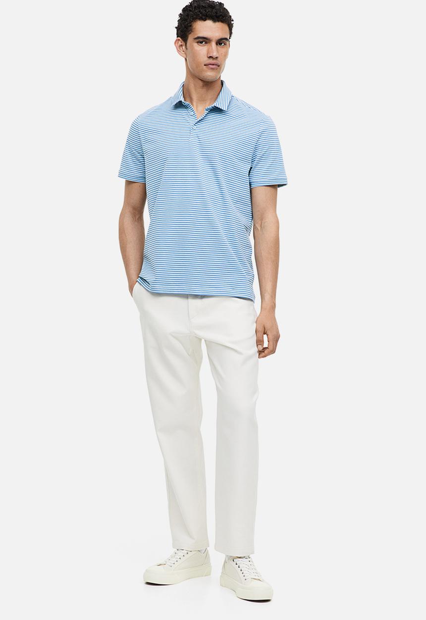 H&M - Slim fit polo shirt - blue/light blue striped