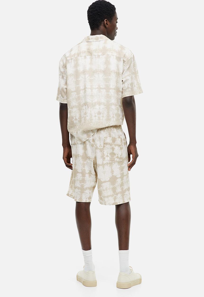 H&M - Relaxed fit linen-blend shorts - beige/white patterned