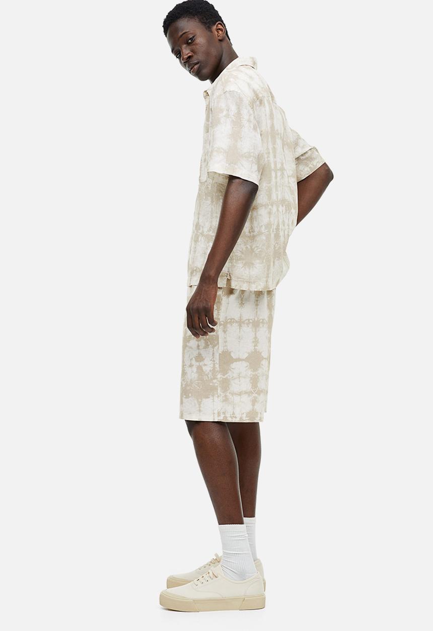 H&M - Relaxed fit linen-blend shorts - beige/white patterned