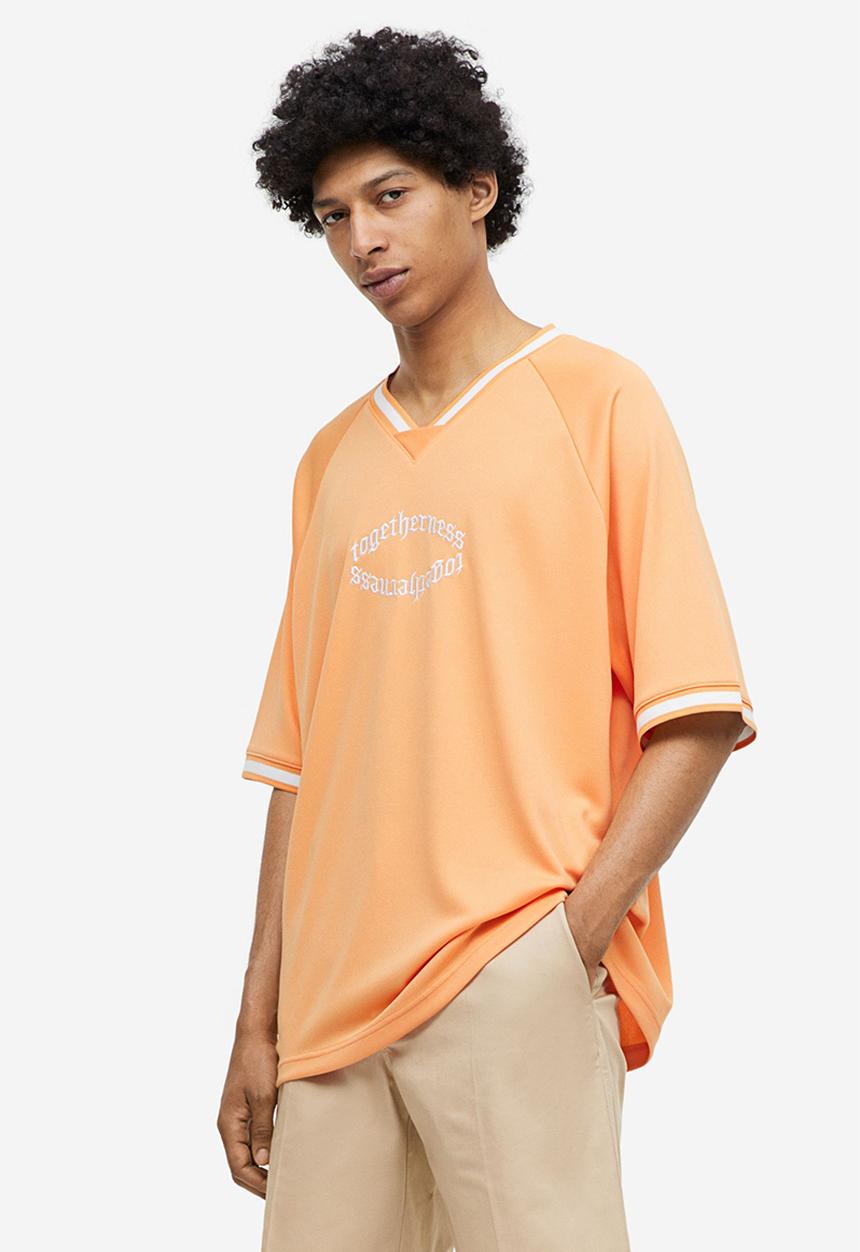 H&M - Oversized fit printed mesh t-shirt - pale orange togetherness