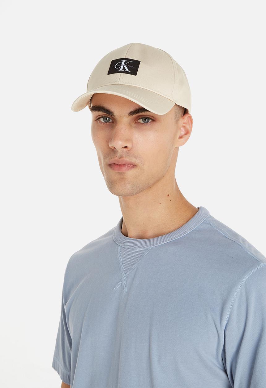 Calvin Klein - Mono logo patch cap- classic beige