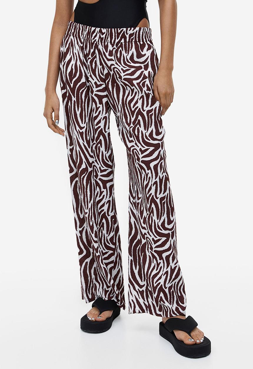 H&M - Crêpe pull-on trousers - dark brown zebra print 