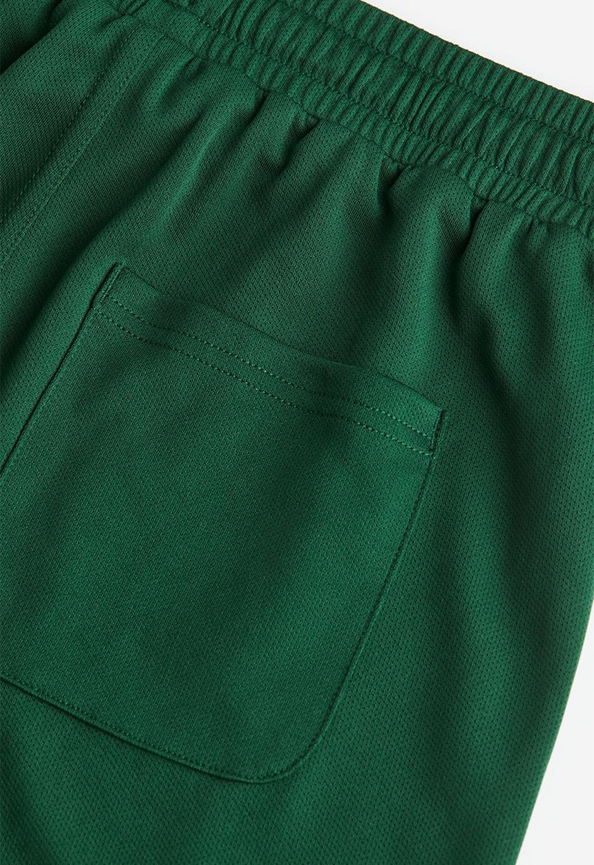 H&M - Printed basketball shorts - dark green/stranger things
