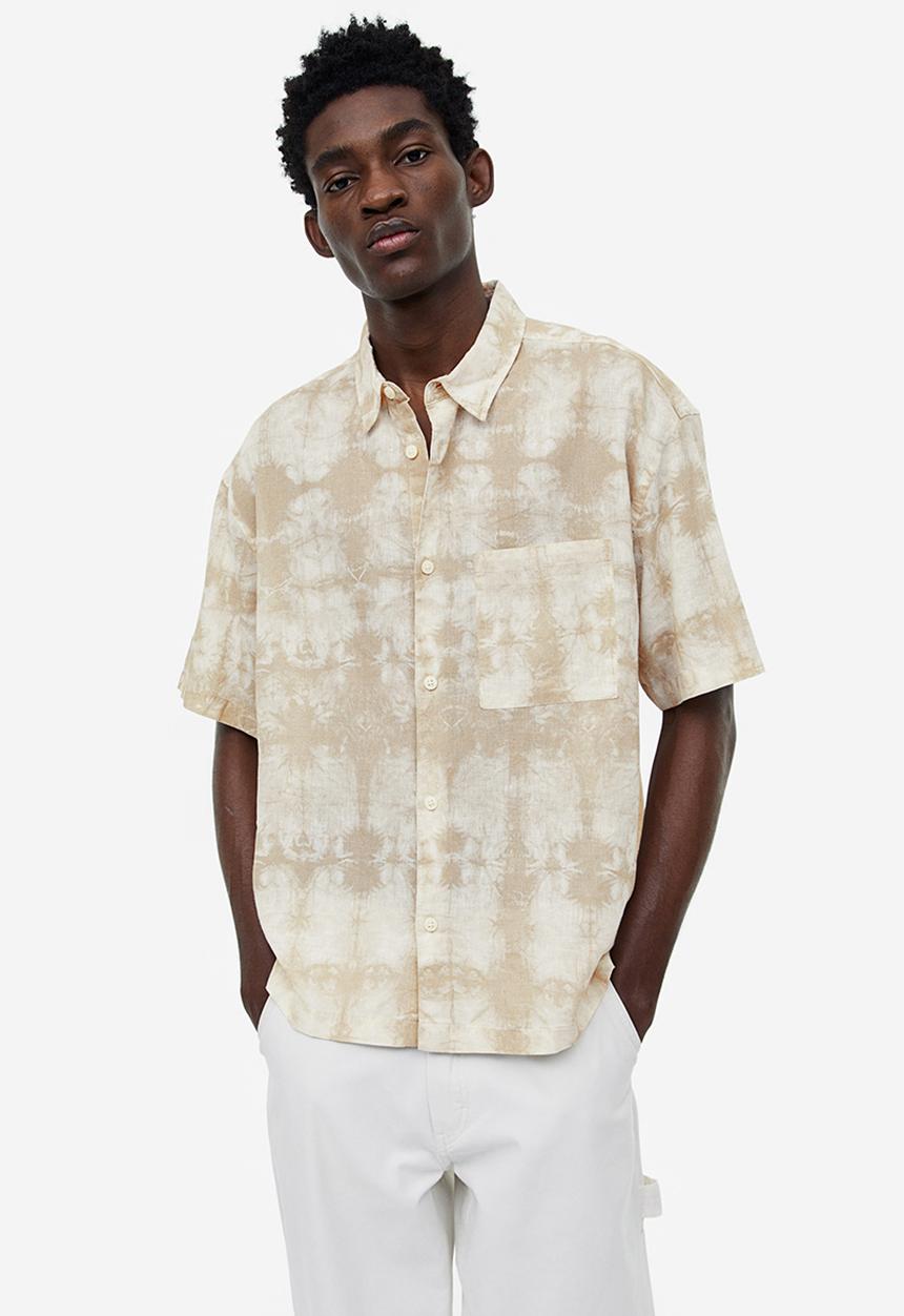H&M - Relaxed fit short-sleeved linen-blend shirt - beige tie-dye