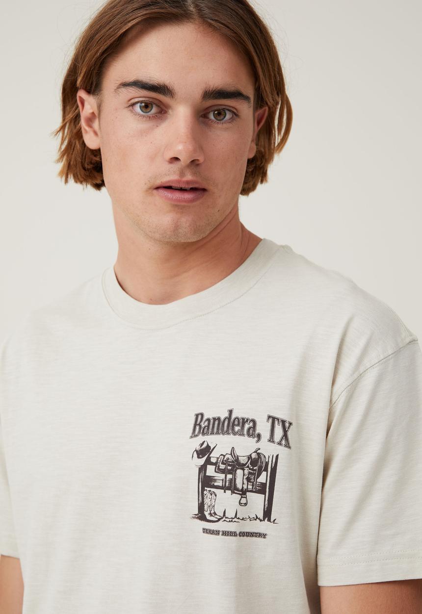 Cotton On - Loose fit graphic T-shirt - ivory/bandera texas