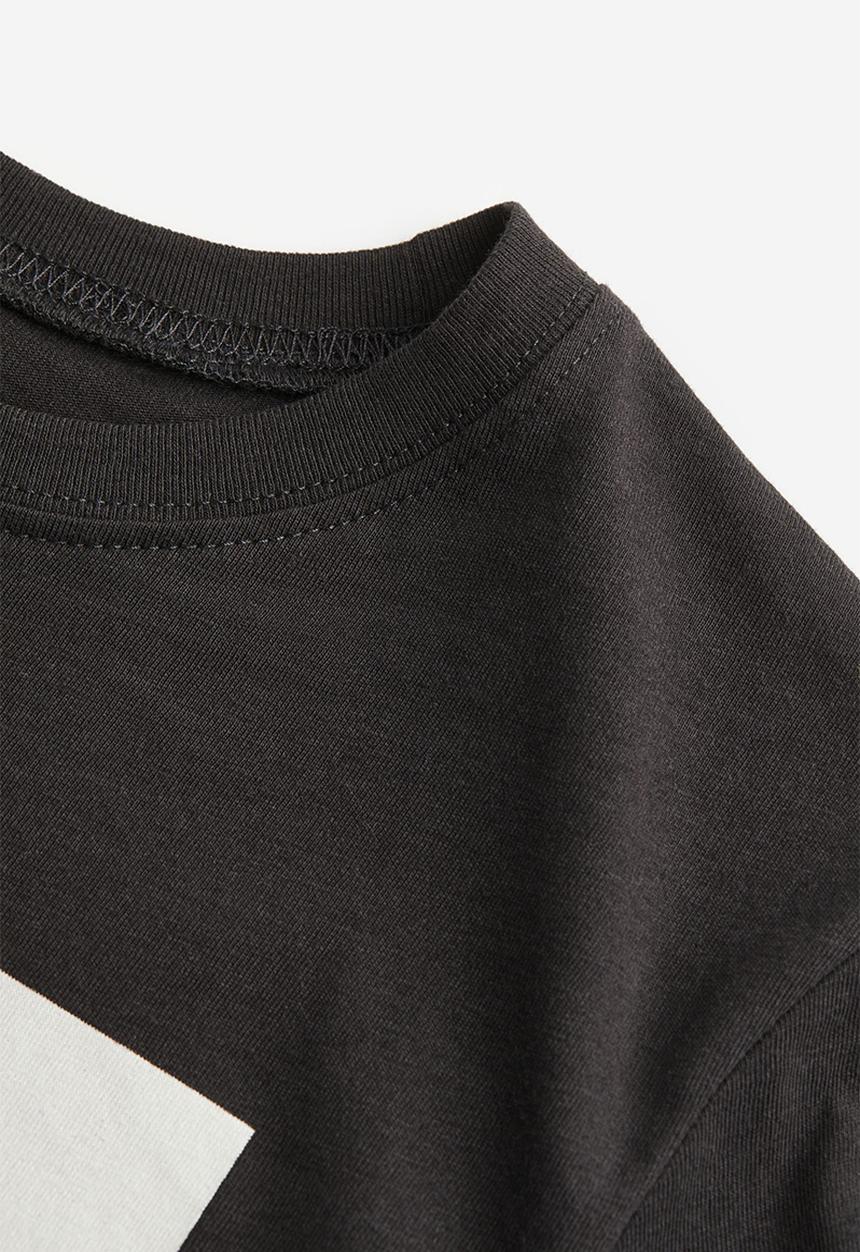 H&M - Printed jersey T-shirt - black refresh restart