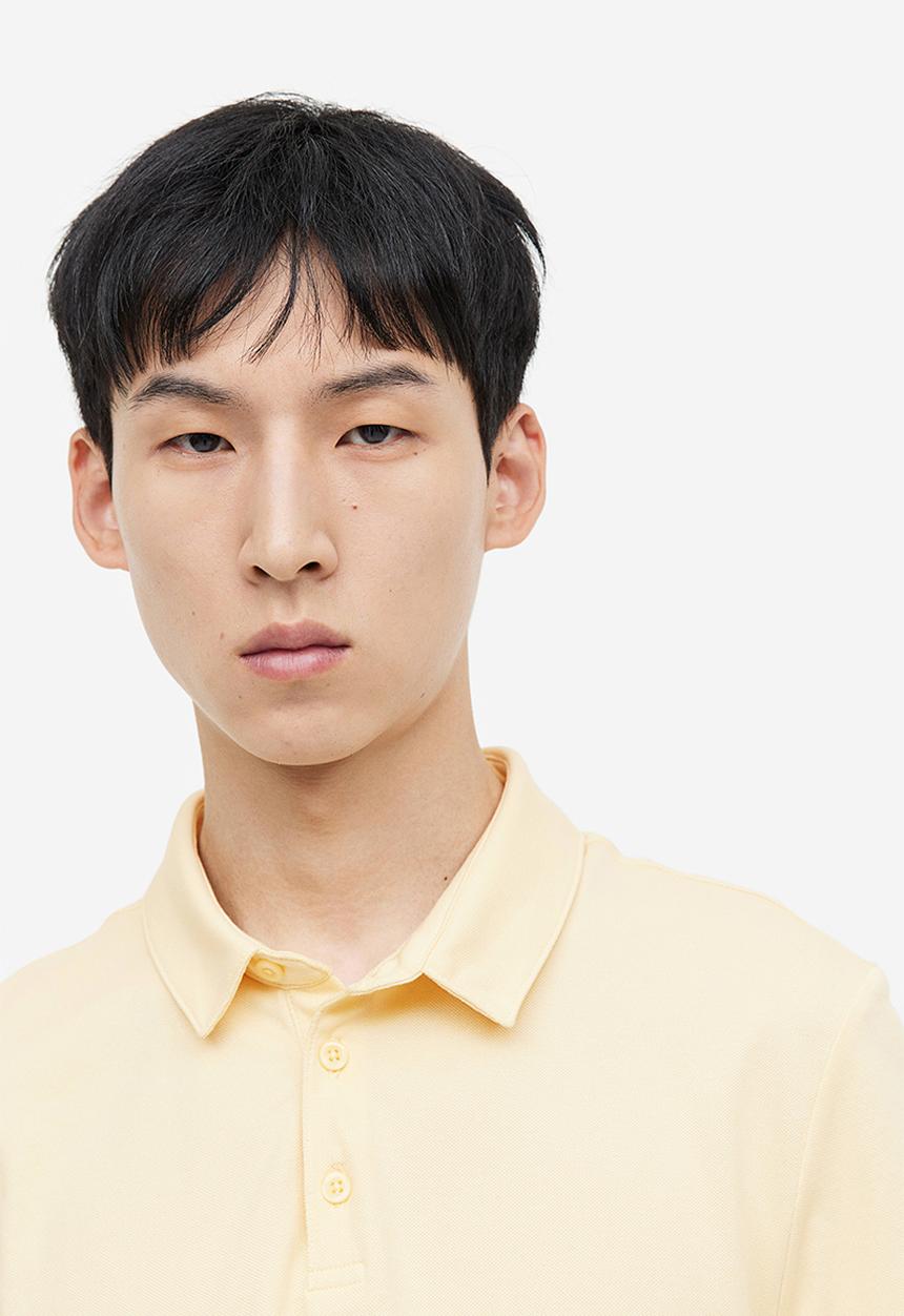 H&M - Coolmax® slim fit polo shirt - light yellow