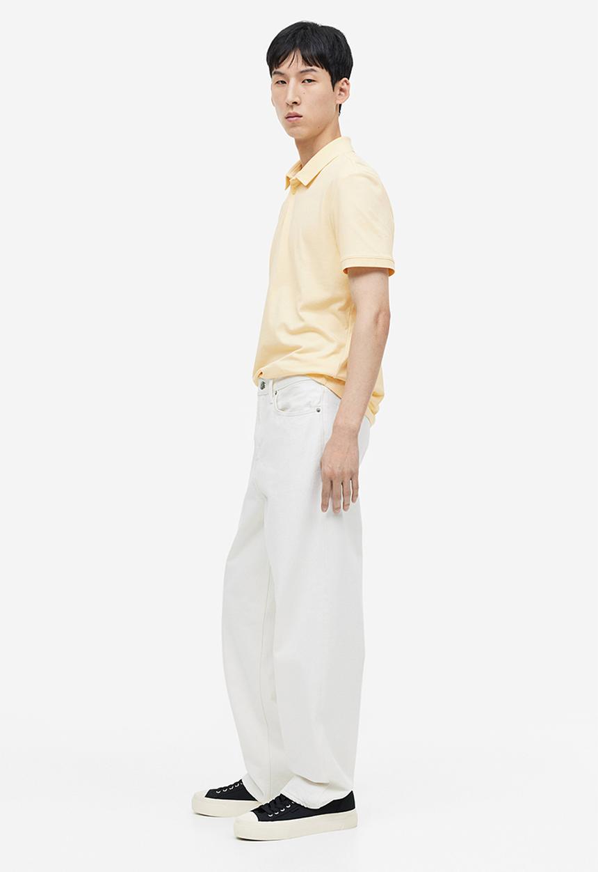 H&M - Coolmax® slim fit polo shirt - light yellow