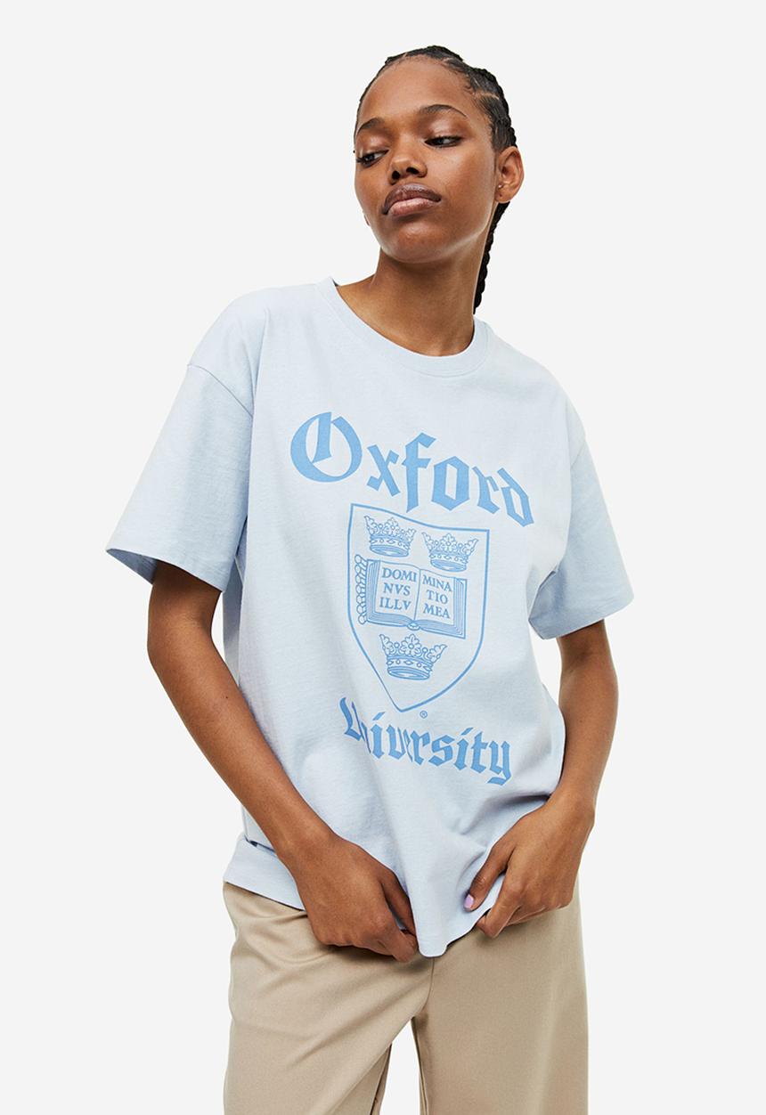 H&M - Oversized printed T-shirt - light blue/oxford university