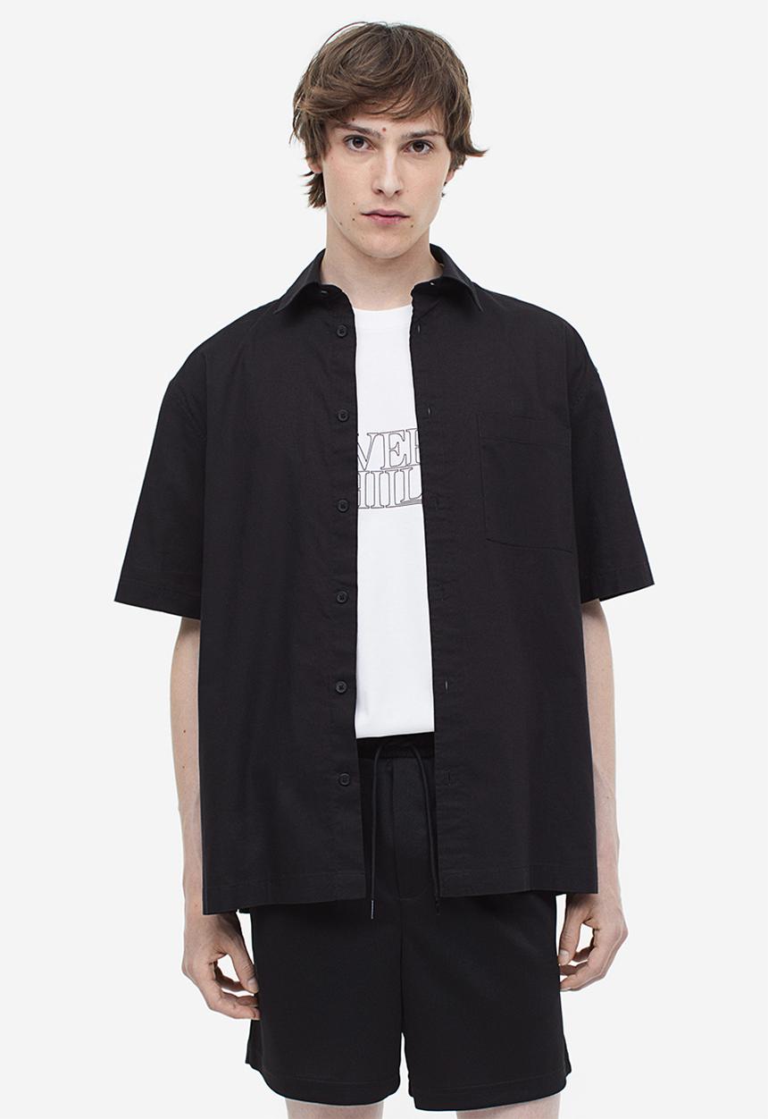 H&M - Relaxed fit mesh shorts - black