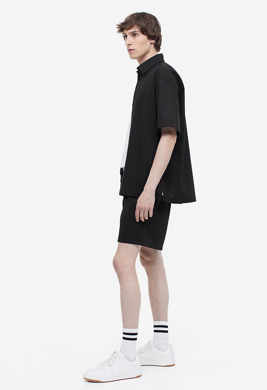 H&M - Relaxed fit mesh shorts - black