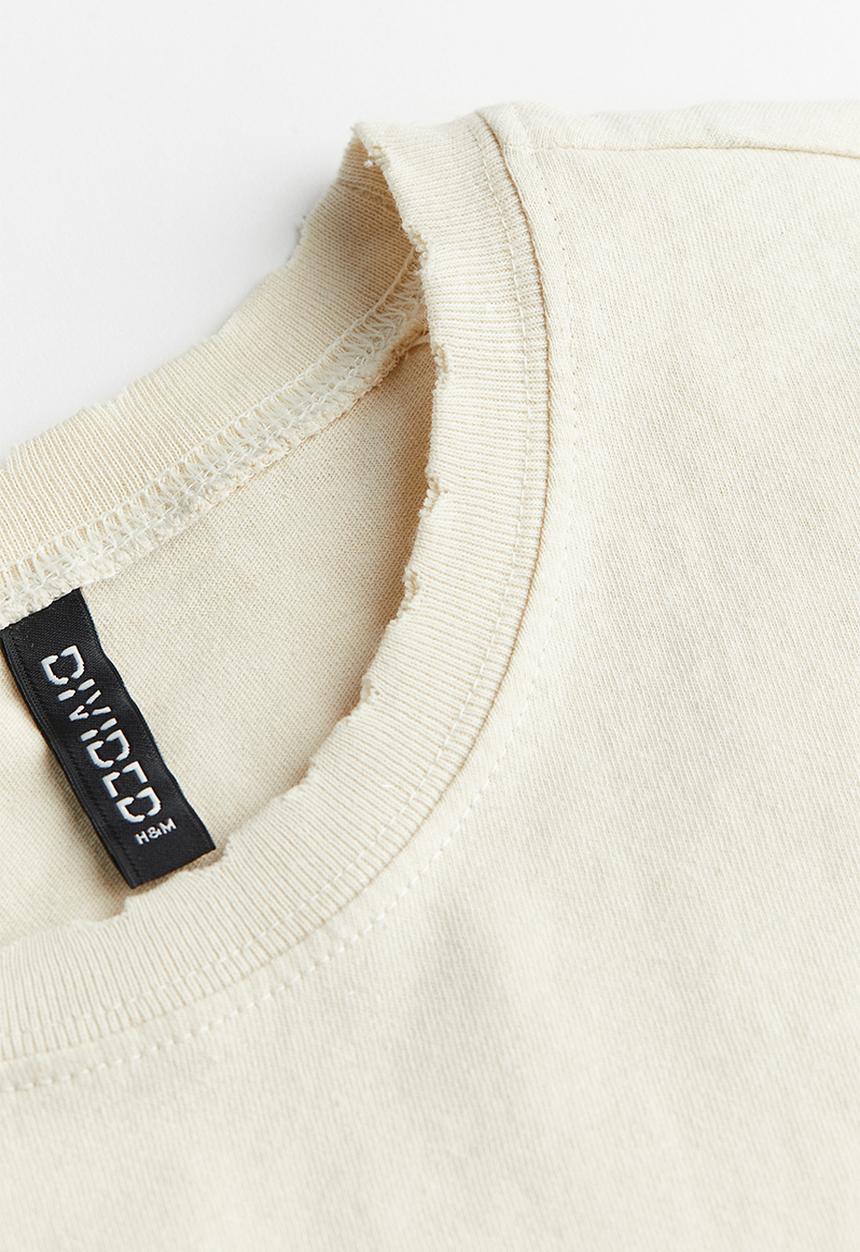 H&M - Oversized printed T-shirt - cream nevada