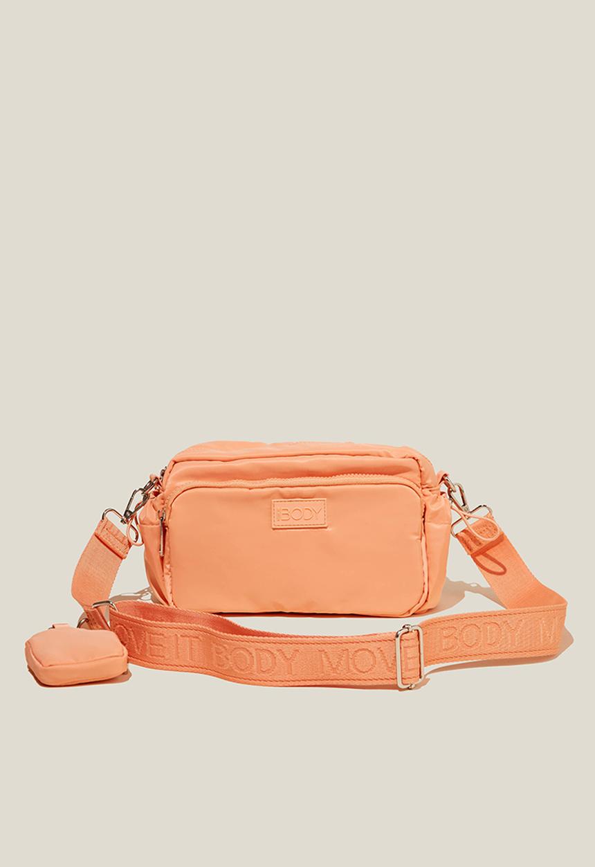 Rubi - Active essential crossbody bag - peachy dream