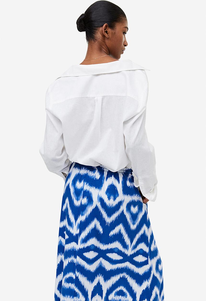 H&M - Flared skirt - bright blue/patterned