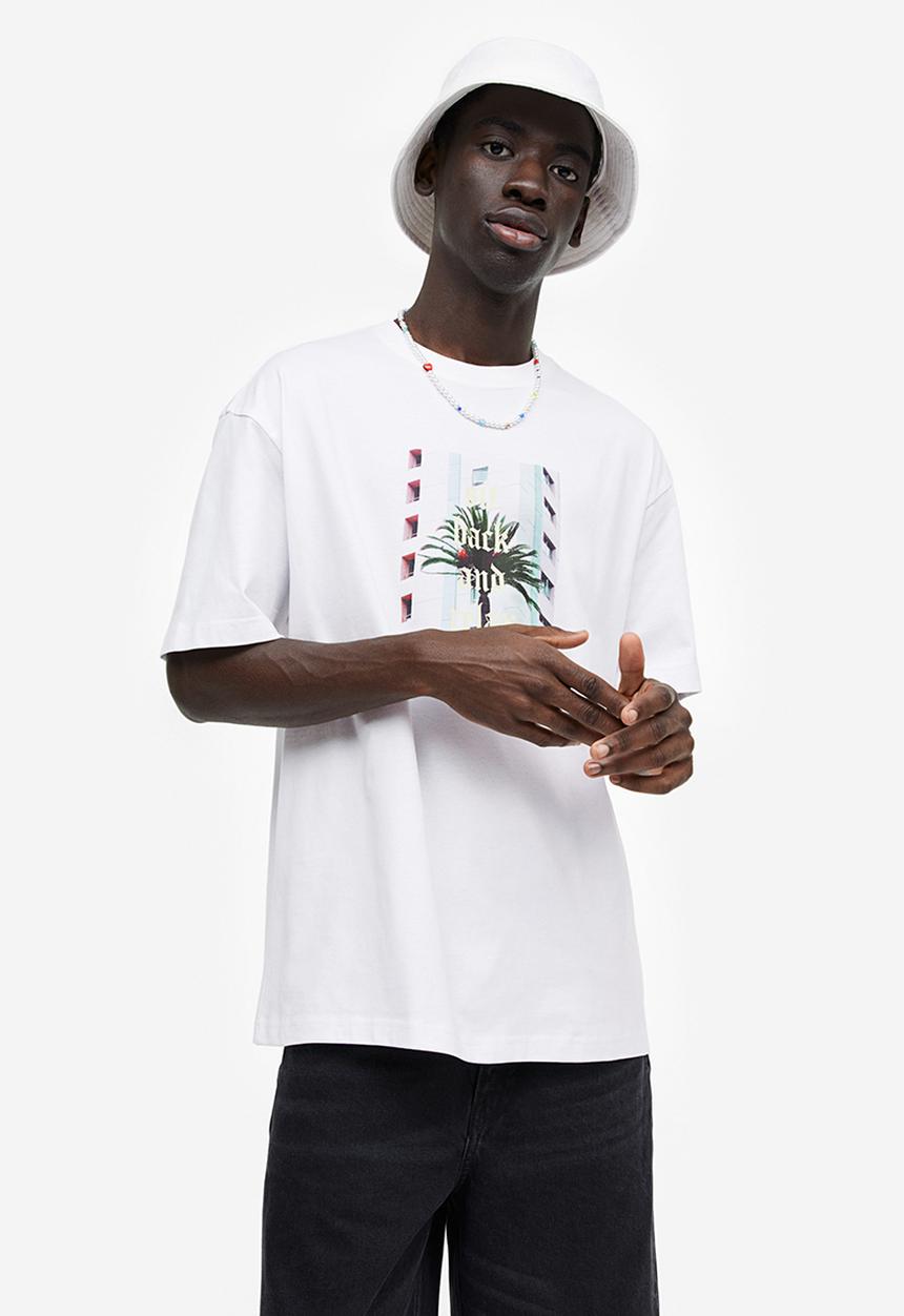 H&M - Relaxed fit printed T-shirt - white sit back and relax