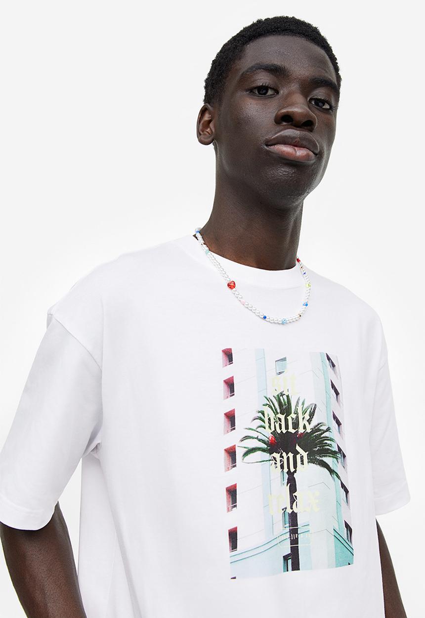 H&M - Relaxed fit printed T-shirt - white sit back and relax